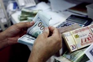 Floating Libyan dinar not on the table amid current political division, official says