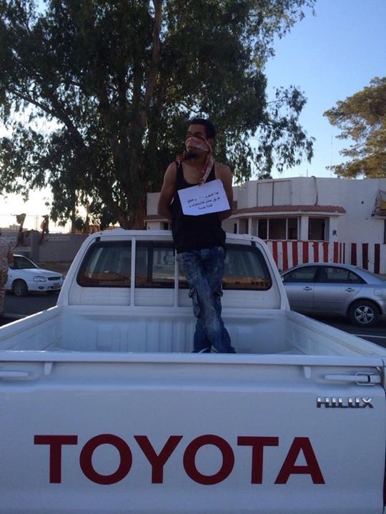 Security forces in Tripoli's Qasir Ben Ghashir district nabbed a notorious criminal and put him on public display. The criminal was caught red-handed committing armed-robbery. Monday, June 29, 2015.
