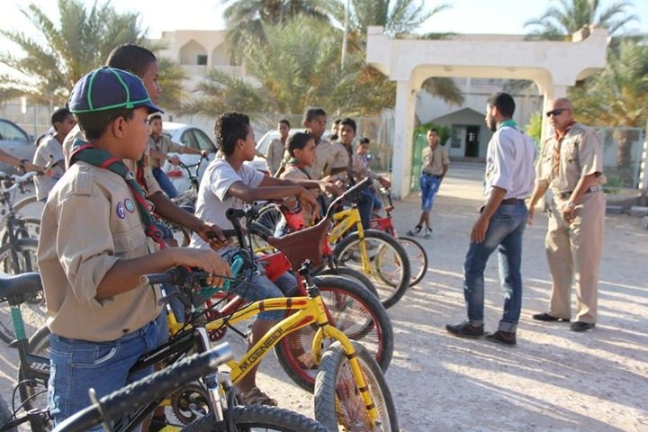 Waddan Scout, an oasis town in southern Libya, holds a peace bike. Tuesday, July 07, 2015. Photos: Waddan Scout